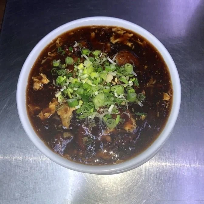 Gaw Gaw Maki — thick soy-based pork soup with green onions